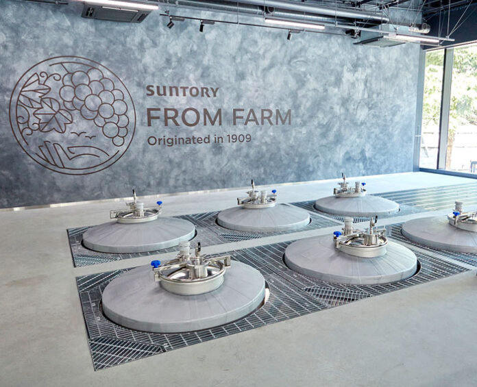 Tanks in the new brewing facility — grape juice is poured in manually from above