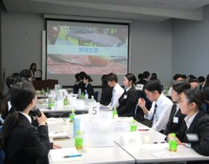 A student asking a question during the Coffee for the Future Department lecture A student asking a question during the Coffee for the Future Department lecture
