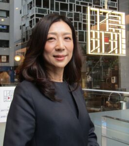 Rina Yamashita of UFS’s Brand Planning Department, Corporate Planning Division speaking at the Aoyama store with the new logo