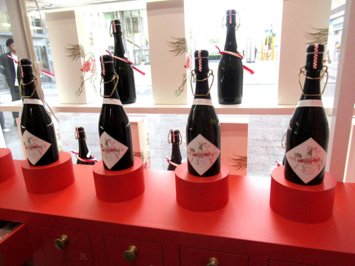 Omikuji sticks inside the bottle. Omikuji sticks inside the bottle.